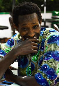 Man participating in the Collaboration program genuinely happy, smiling and actively participating in the dynamics