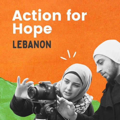 Action for Hope, Lebanon. A woman in a hijab adjusts a camera alongside a man in a white hat.