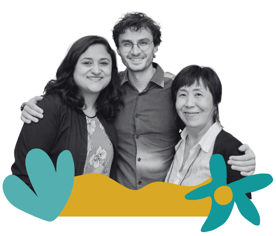 3 members of the Spring team stand smiling 