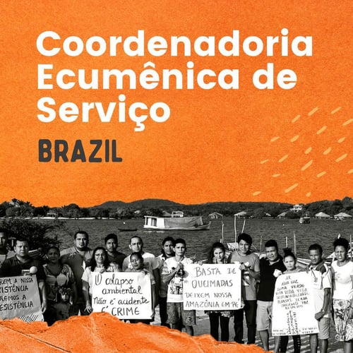 Coordenadoria Ecumênica de Serviço - Brazil. People hold signs in Portuguese in front of a rive. Black and white photogrpah.