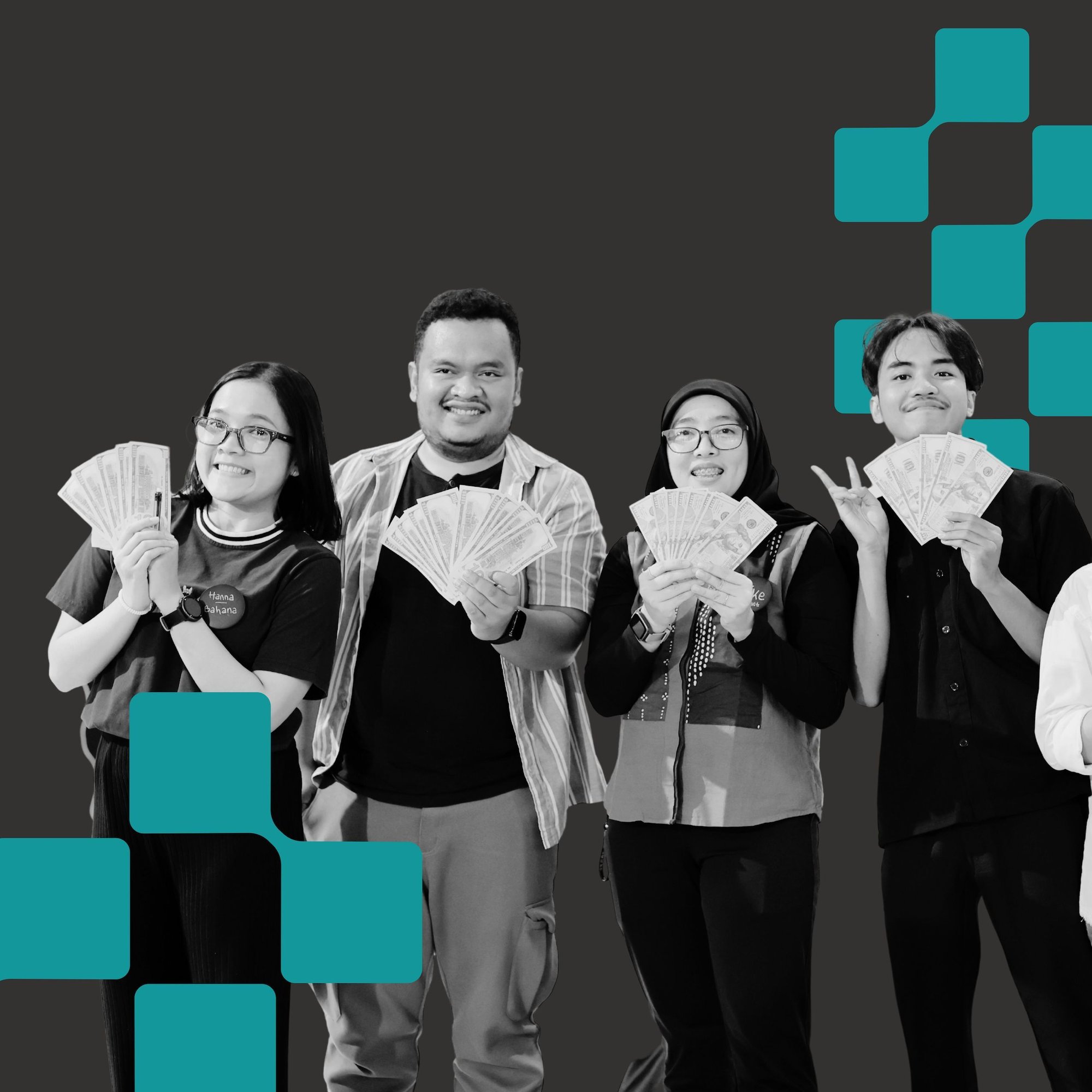 Four FIRE participants smiling with fake cash