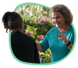 Spring coach sits talking to a client