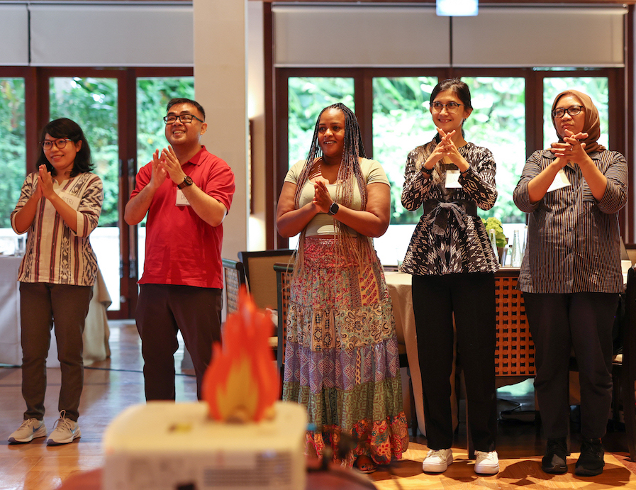 5 people stand in a line doing a state shift exercise during a FIRE training